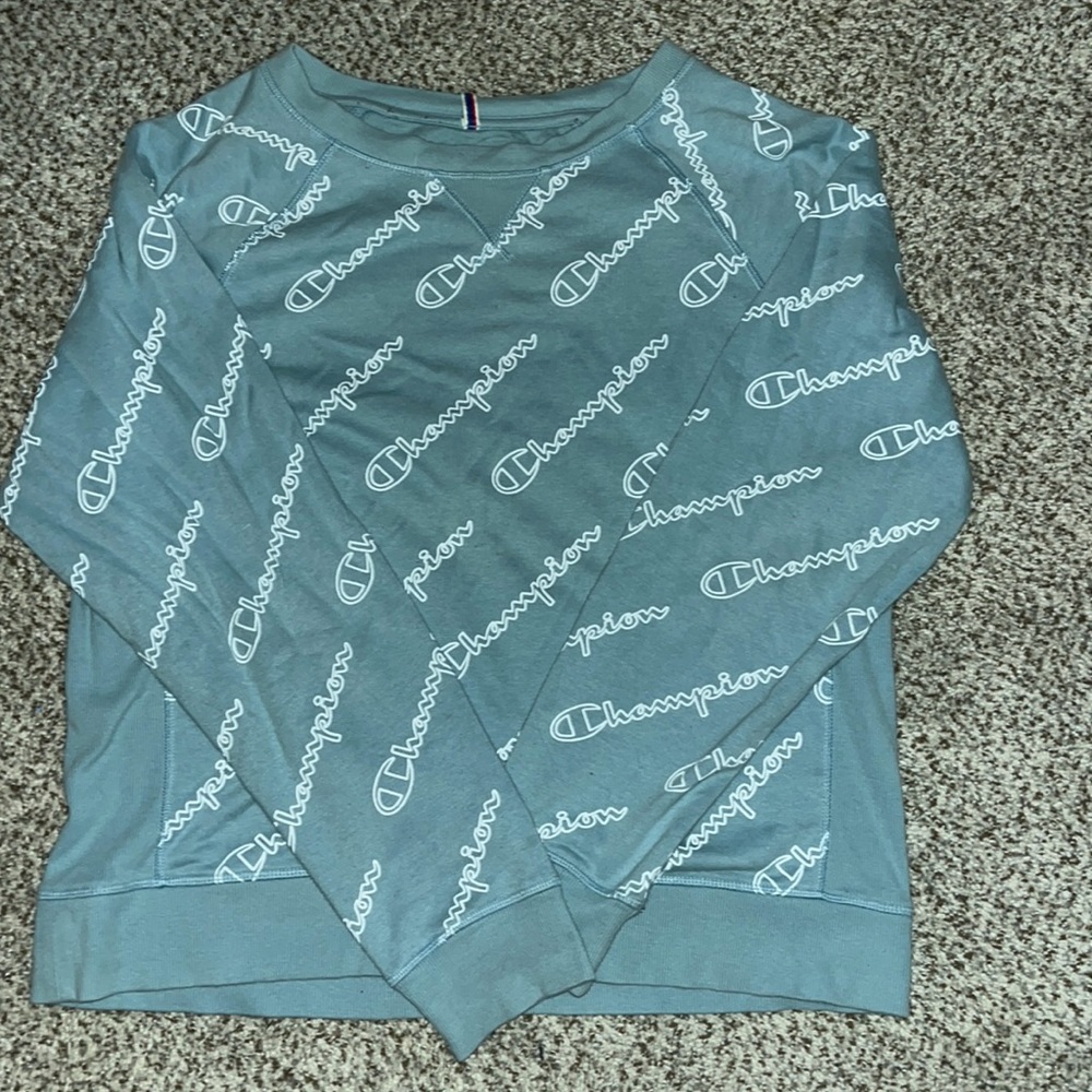 I am selling a blue and white champion crew neck. super cute very comfortable.